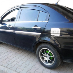 Накладка на лючок бензобака OmsaLine (нерж.) для Hyundai Accent 2006-2010 рр